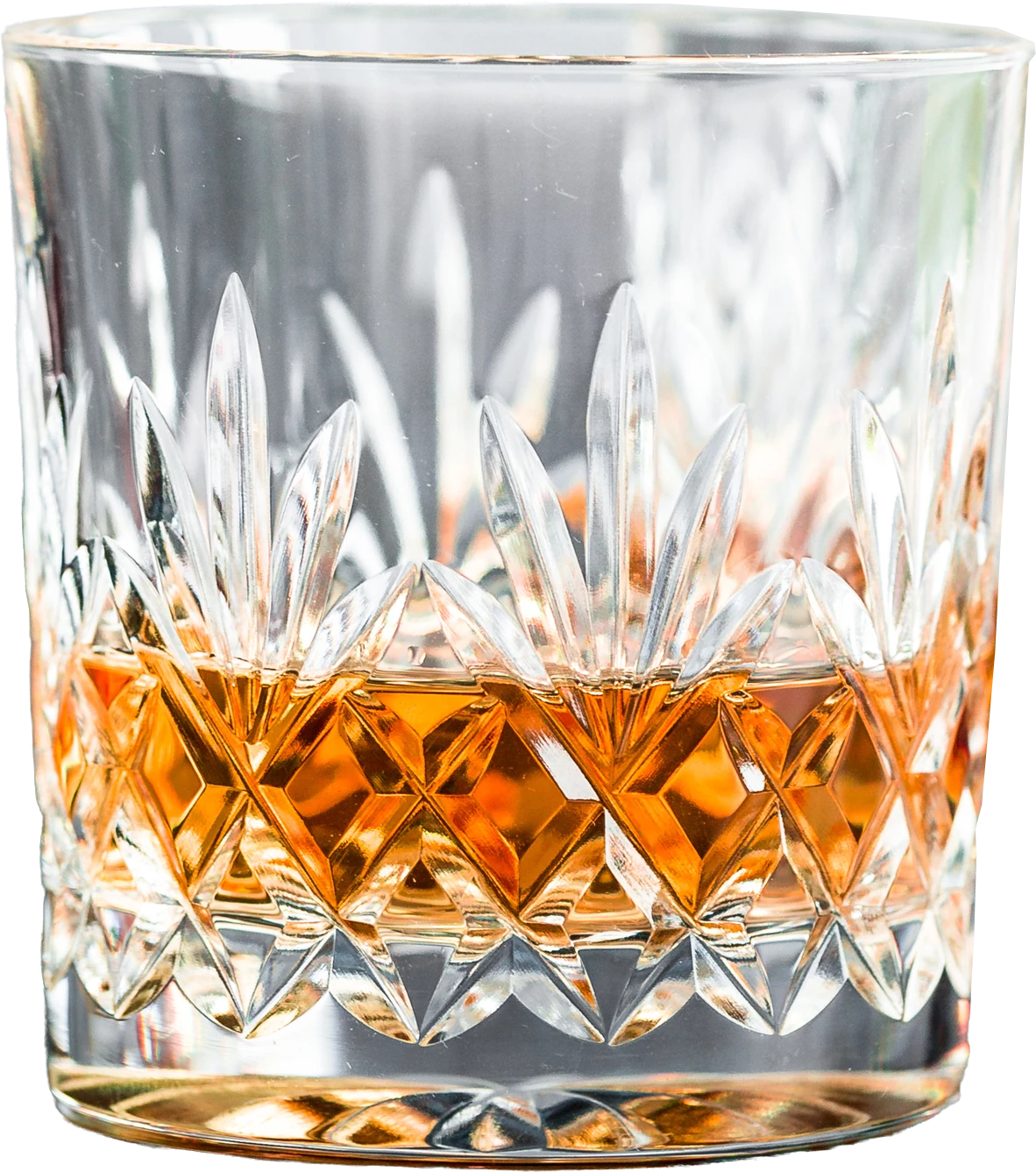 Whiskey served in a cut-crystal rocks glass